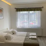 Andi -